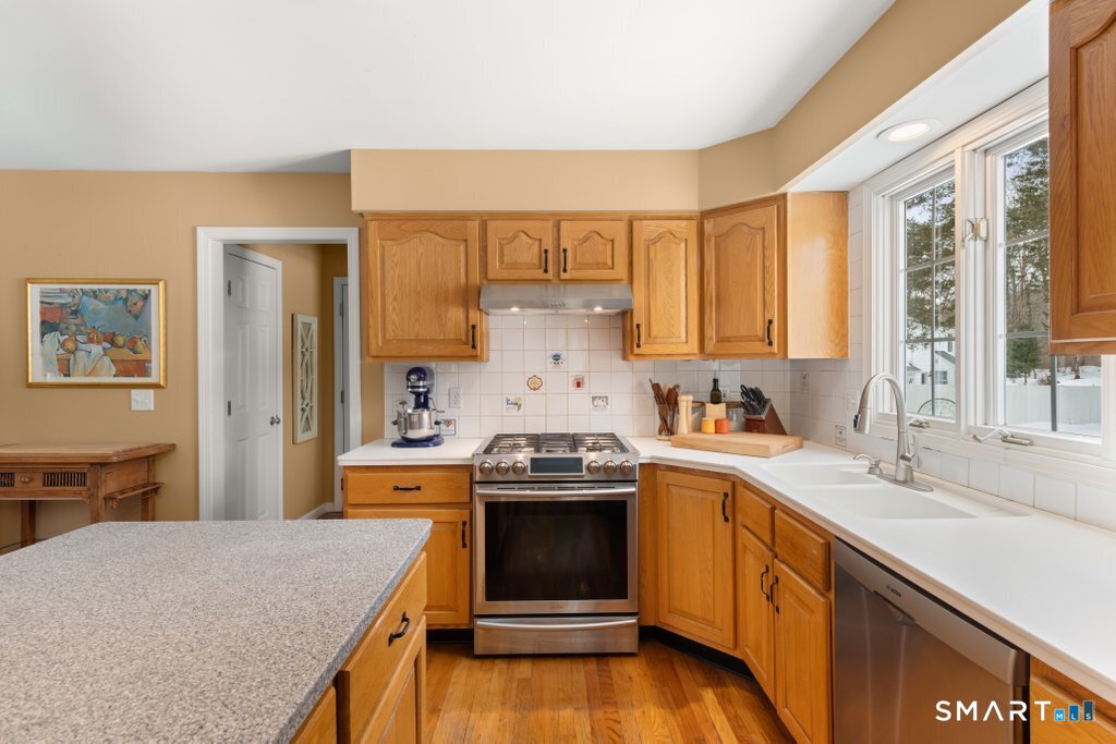 3 Owl Ridge Lane Sandy Hook, CT 06482 - Photo 28 of 40 a kitchen with a stove and a sink