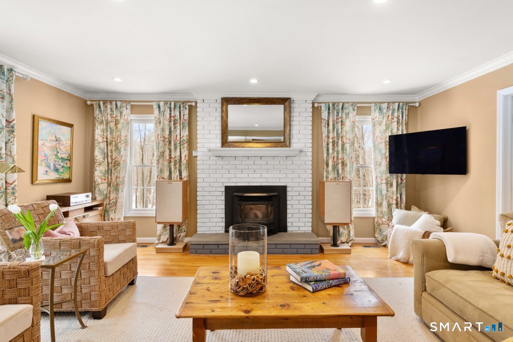 3 Owl Ridge Lane Sandy Hook, CT 06482 - Photo 5 of 40 a living room with furniture and a fireplace