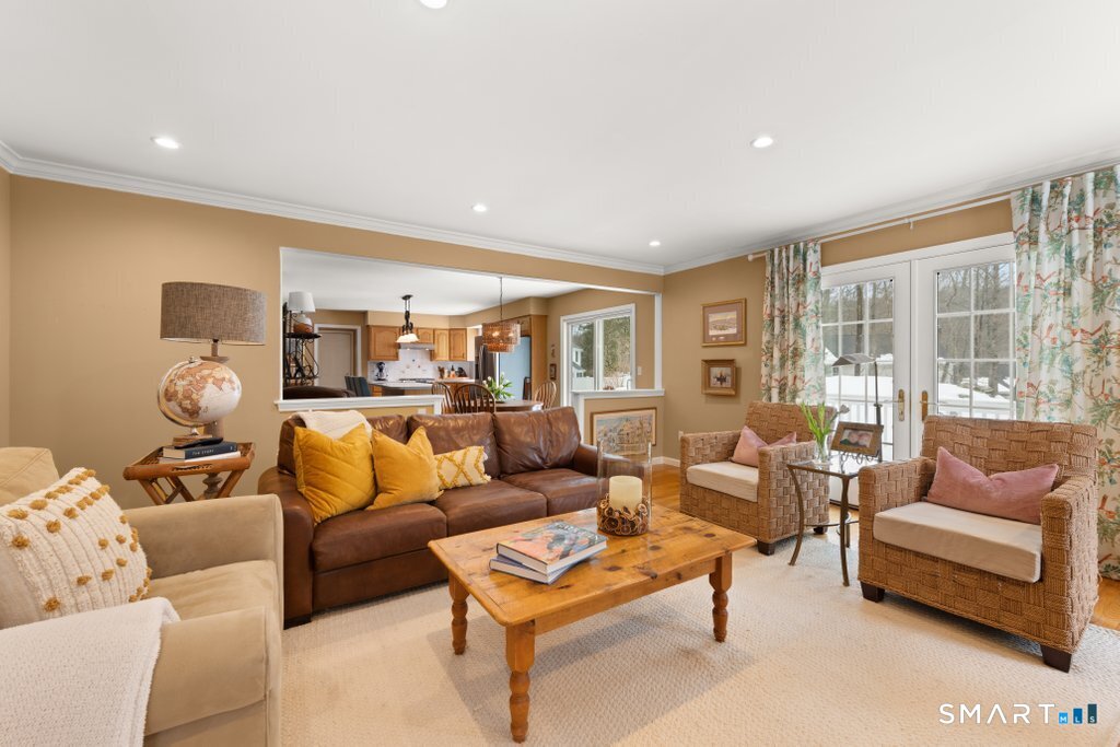 3 Owl Ridge Lane Sandy Hook, CT 06482 - Photo 7 of 40 a living room with furniture and a large window