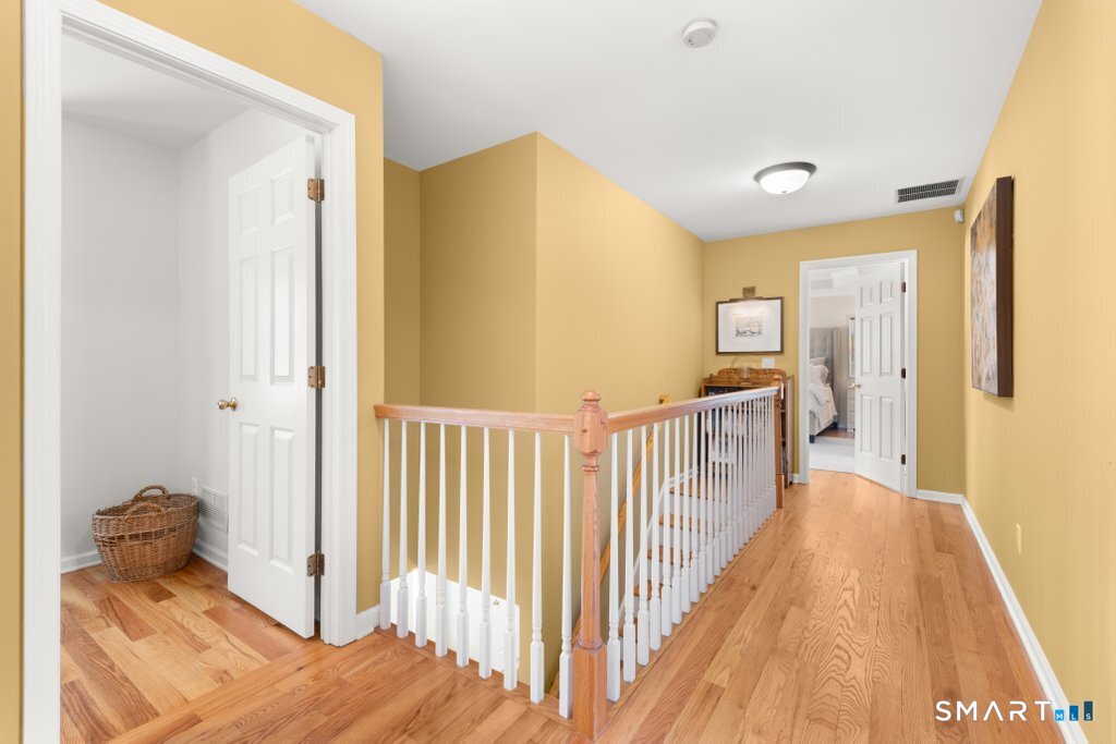 3 Owl Ridge Lane Sandy Hook, CT 06482 - Photo 8 of 40 a view of a bedroom from a hallway
