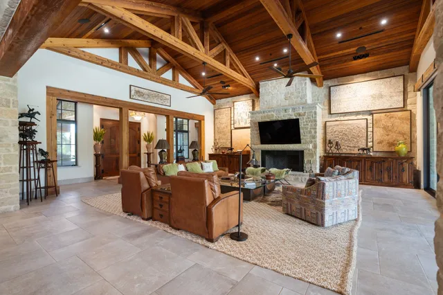 a kitchen with stainless steel appliances granite countertop a stove and a refrigerator