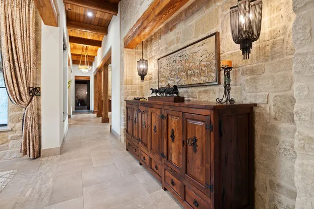 a view of a living room and a large window