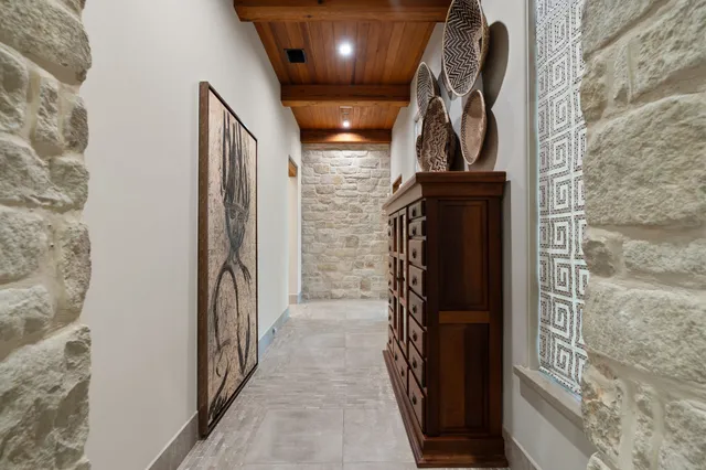 a spacious bathroom with a double vanity sink toilet and shower