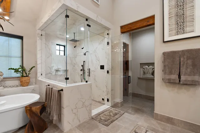 a bathroom with a toilet a sink and a mirror