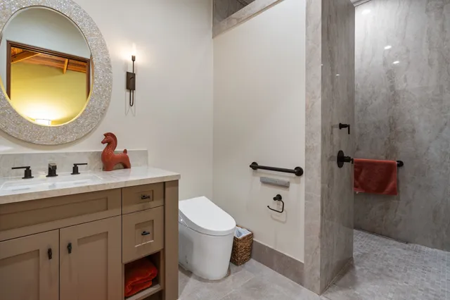 a bedroom with furniture and a window