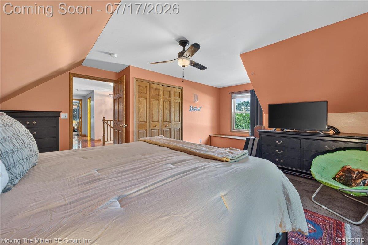 40162 Alden Road Belleville, MI 48111 - Photo 32 of 67 Bedroom featuring wood-finish flooring, a ceiling fan, and a built-in window bench