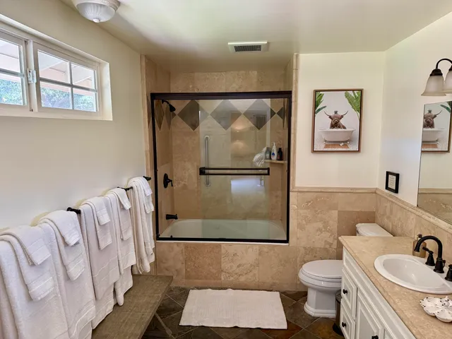 a bathroom with a sink and a shower