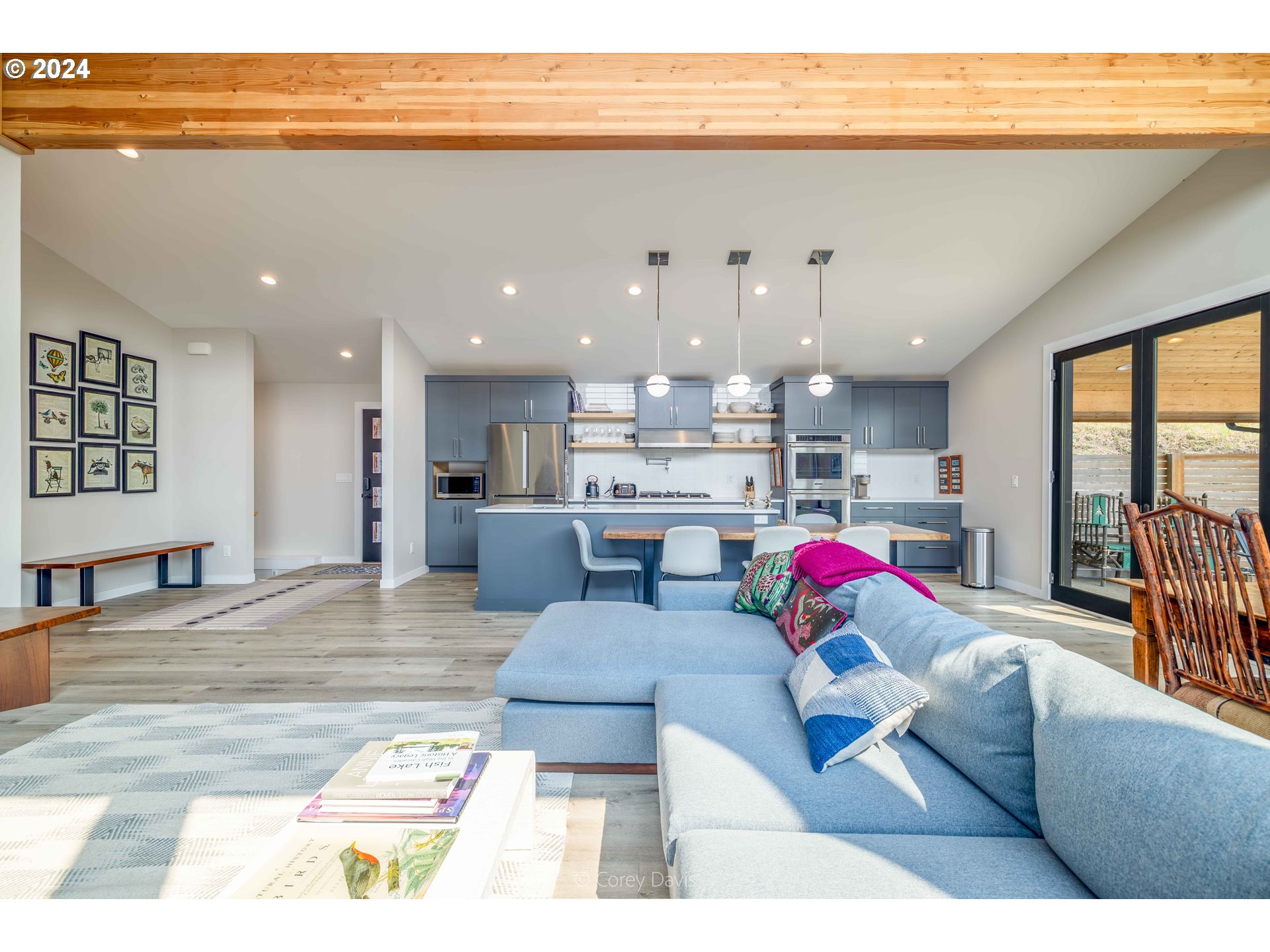 8760 Mariners Nehalem, OR 97131 - Photo 12 of 40 a living room with furniture and kitchen view