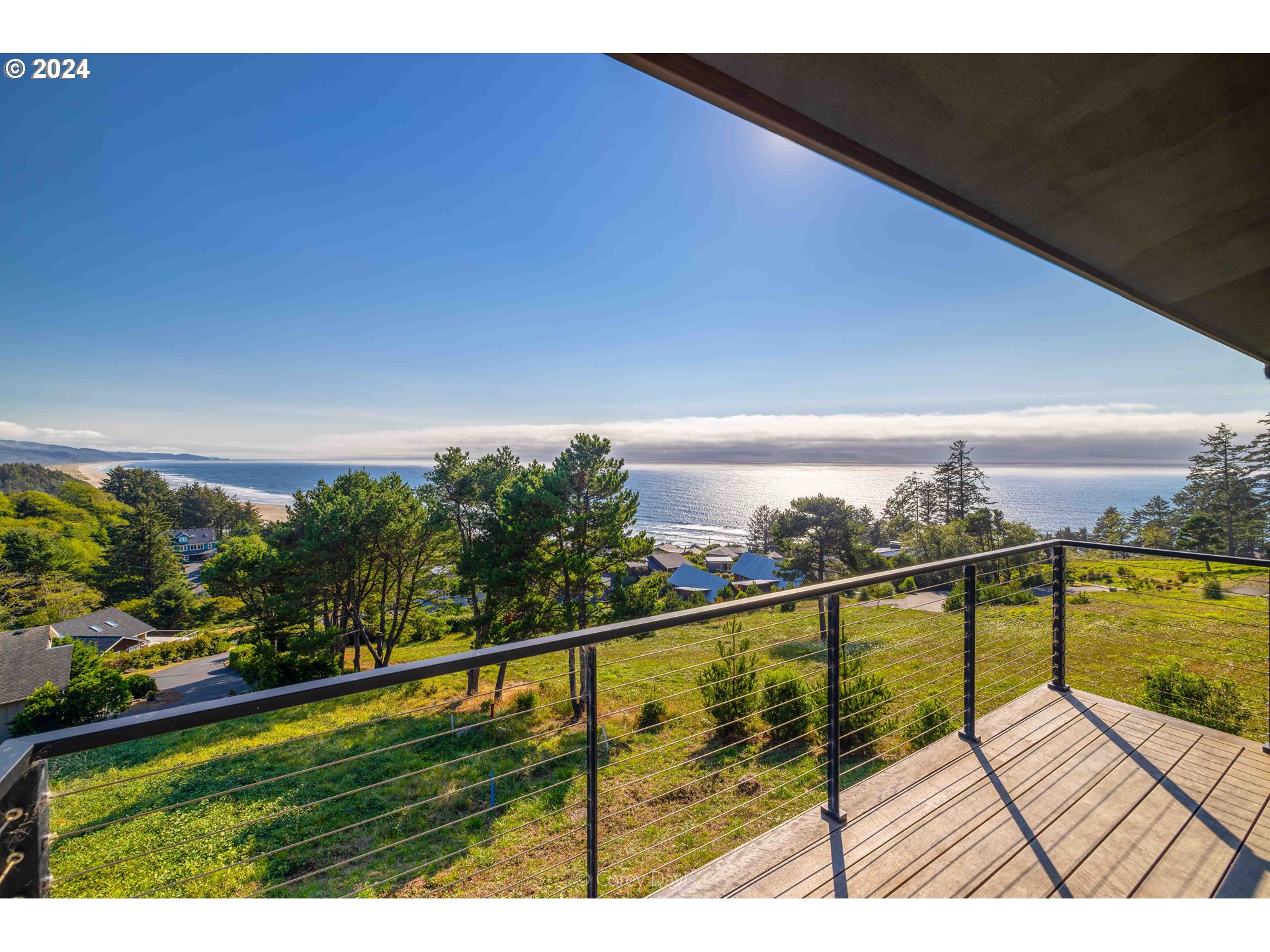 8760 Mariners Nehalem, OR 97131 - Photo 19 of 40 a view of ocean from a balcony