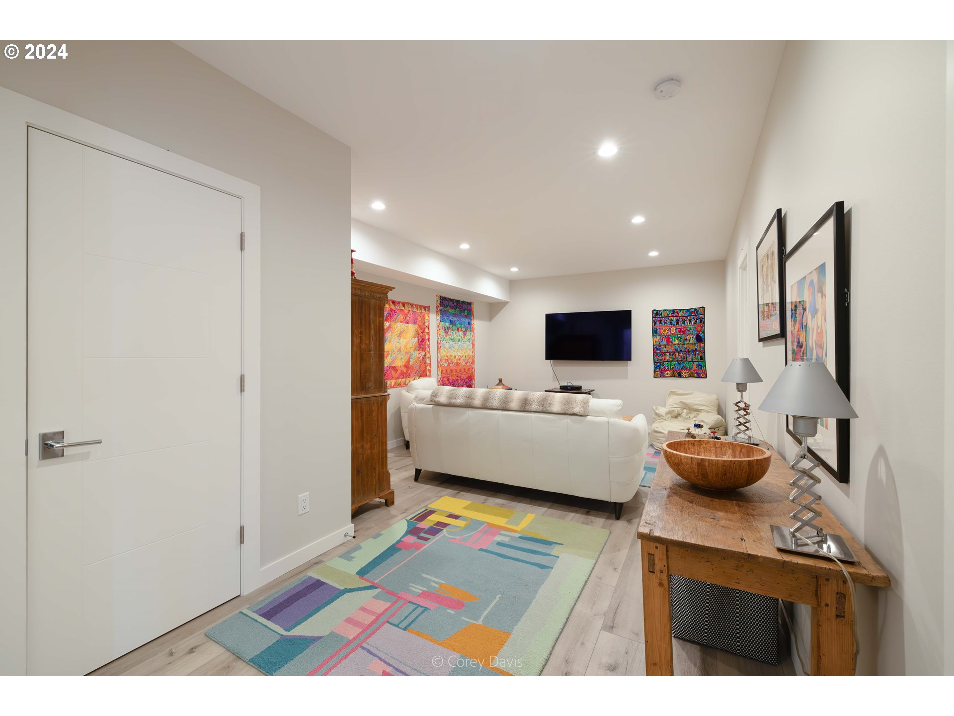 8760 Mariners Nehalem, OR 97131 - Photo 25 of 40 a living room with furniture and a flat screen tv