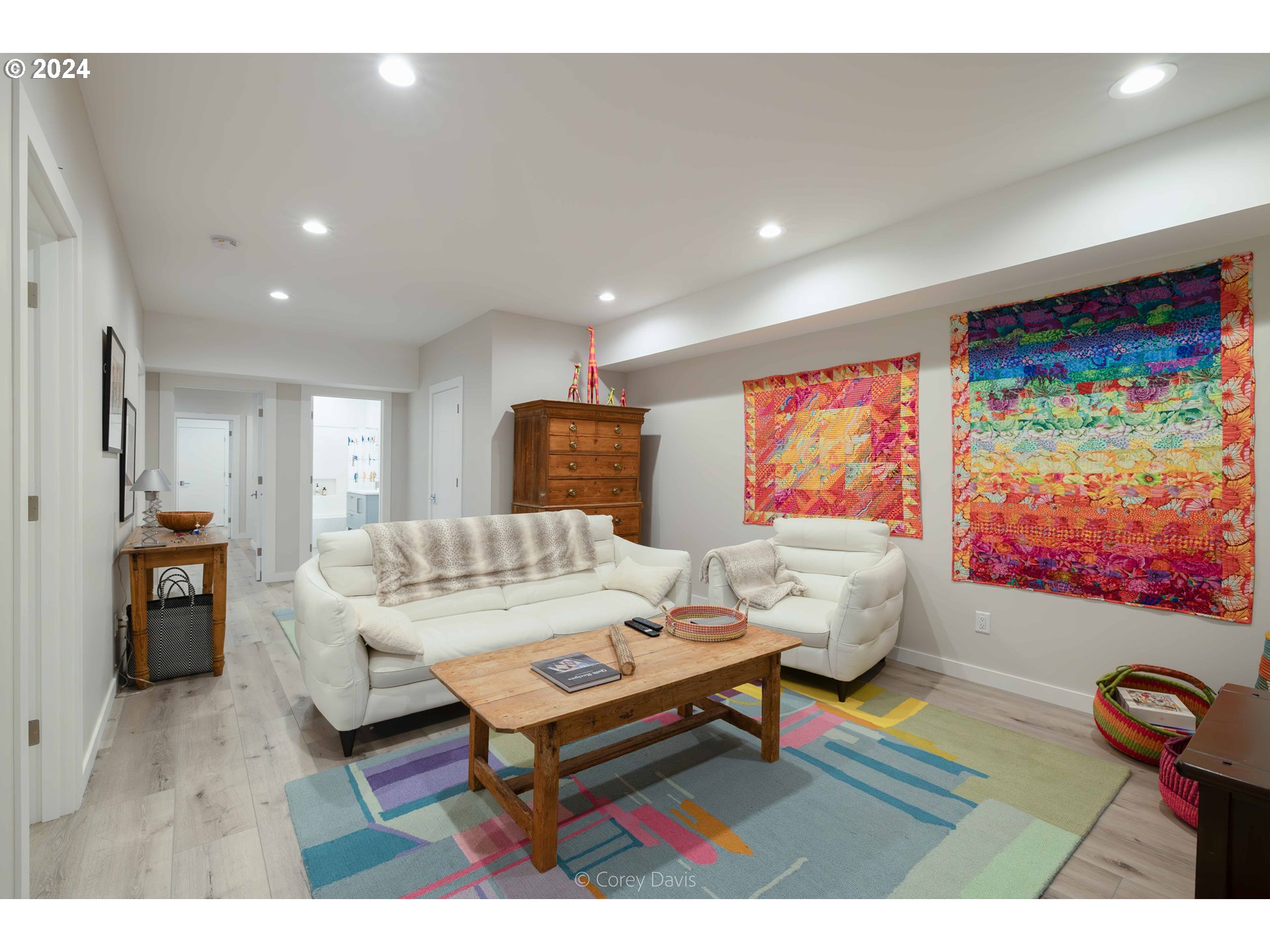 8760 Mariners Nehalem, OR 97131 - Photo 26 of 40 a living room with furniture and a flat screen tv