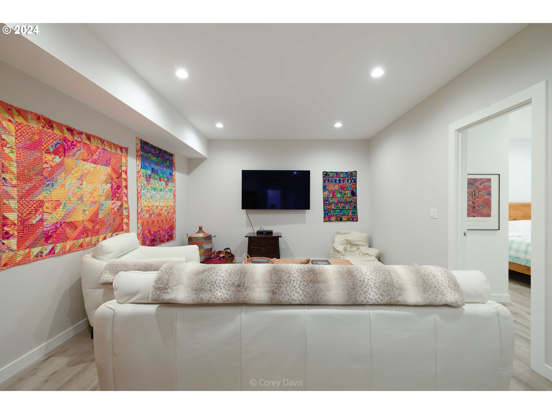 8760 Mariners Nehalem, OR 97131 - Photo 27 of 40 a living room with furniture and a flat screen tv