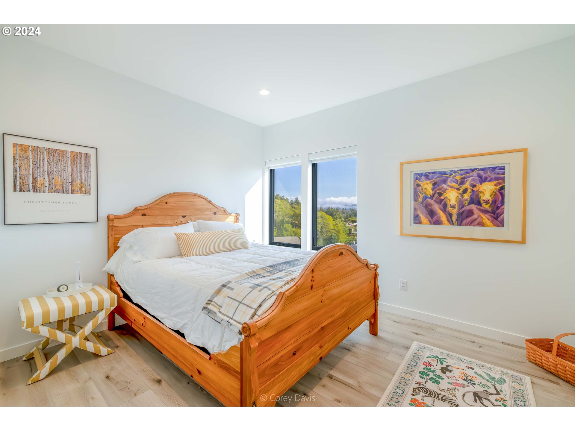 8760 Mariners Nehalem, OR 97131 - Photo 30 of 40 a bedroom with a bed and window