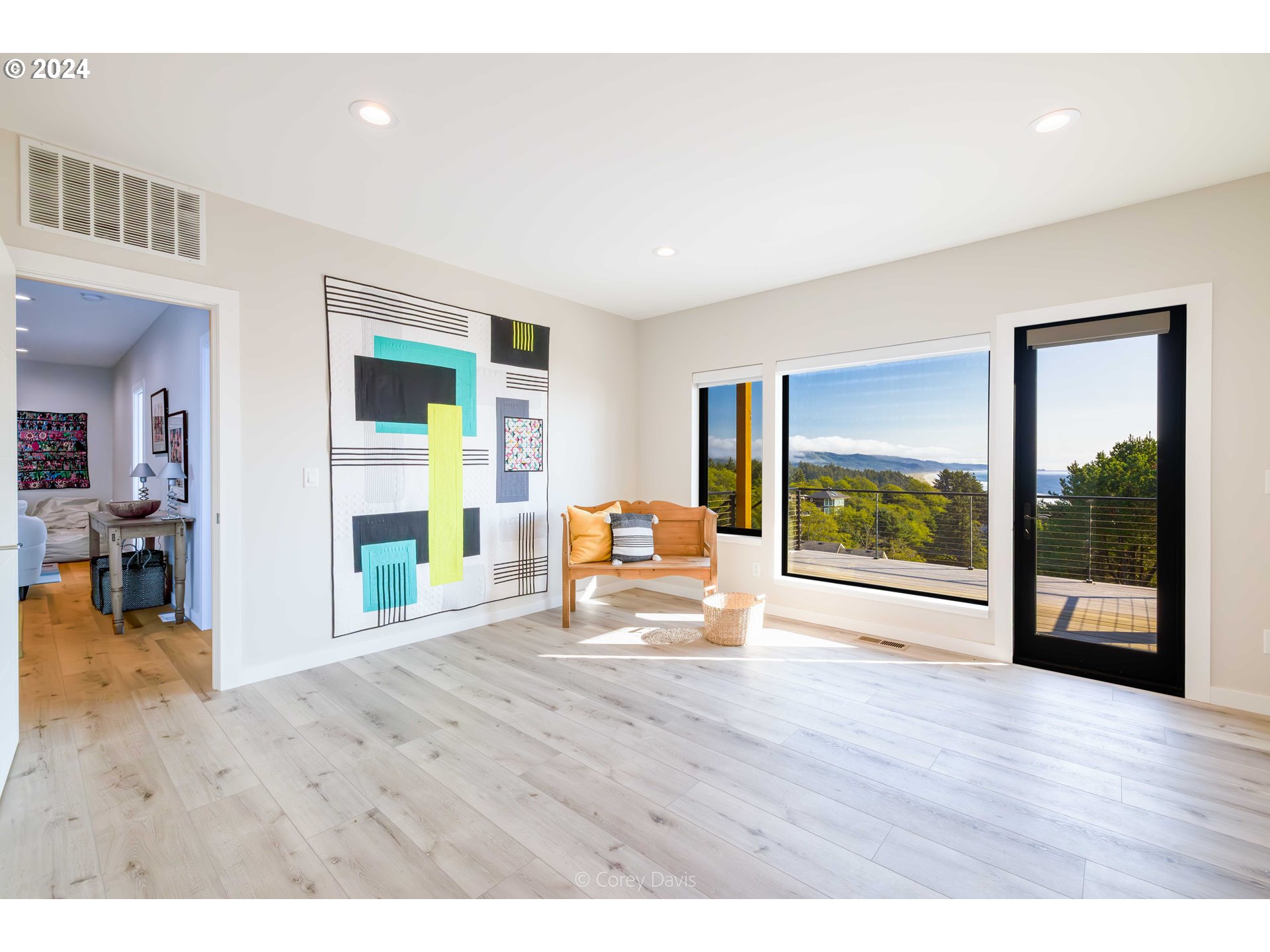8760 Mariners Nehalem, OR 97131 - Photo 35 of 40 a view of livingroom with furniture window and front door