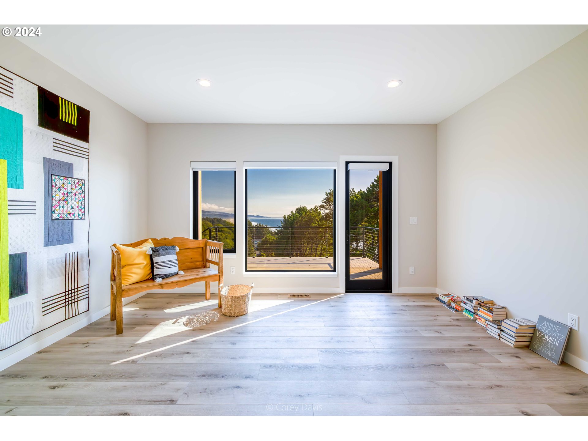 8760 Mariners Nehalem, OR 97131 - Photo 36 of 40 a living room with furniture and a large window
