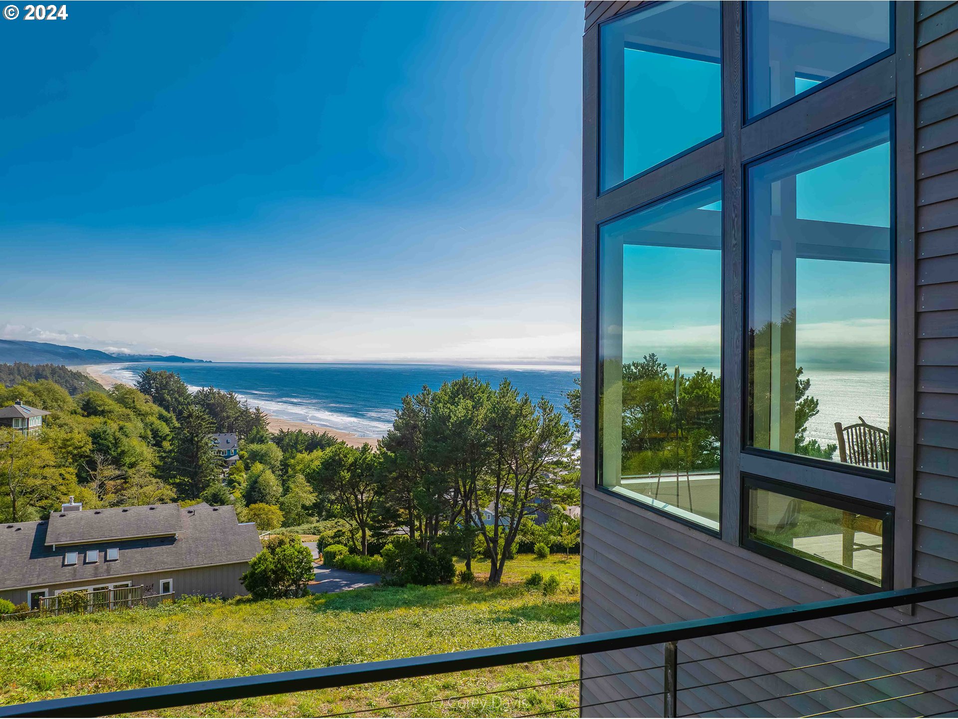 8760 Mariners Nehalem, OR 97131 - Photo 5 of 40 wooden floor with a yard
