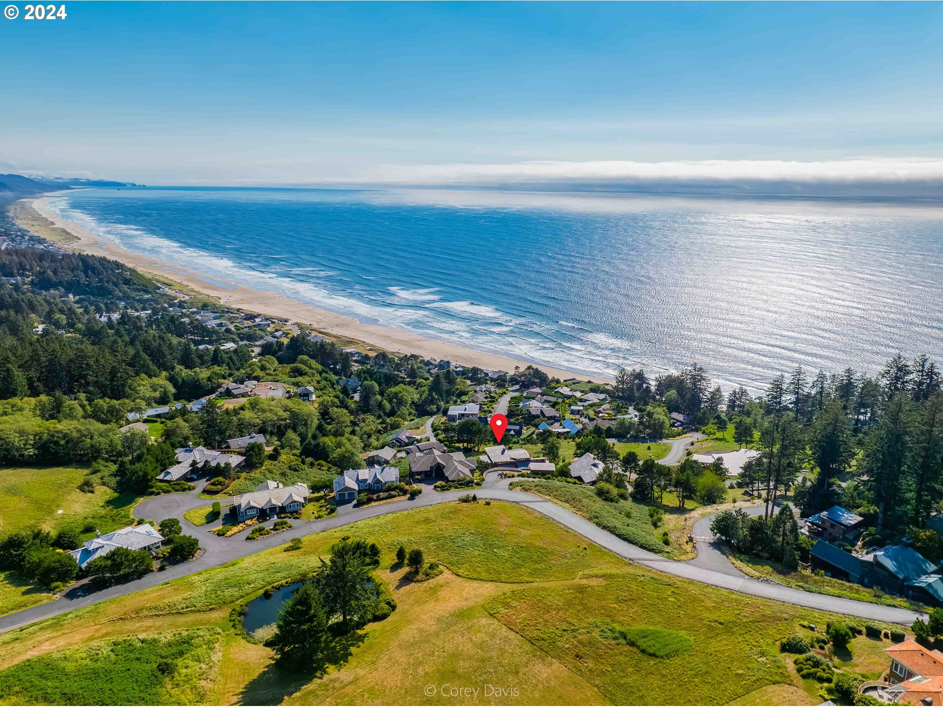 8760 Mariners Nehalem, OR 97131 - Photo 6 of 40 a view of a swimming pool with an outdoor seating and yard