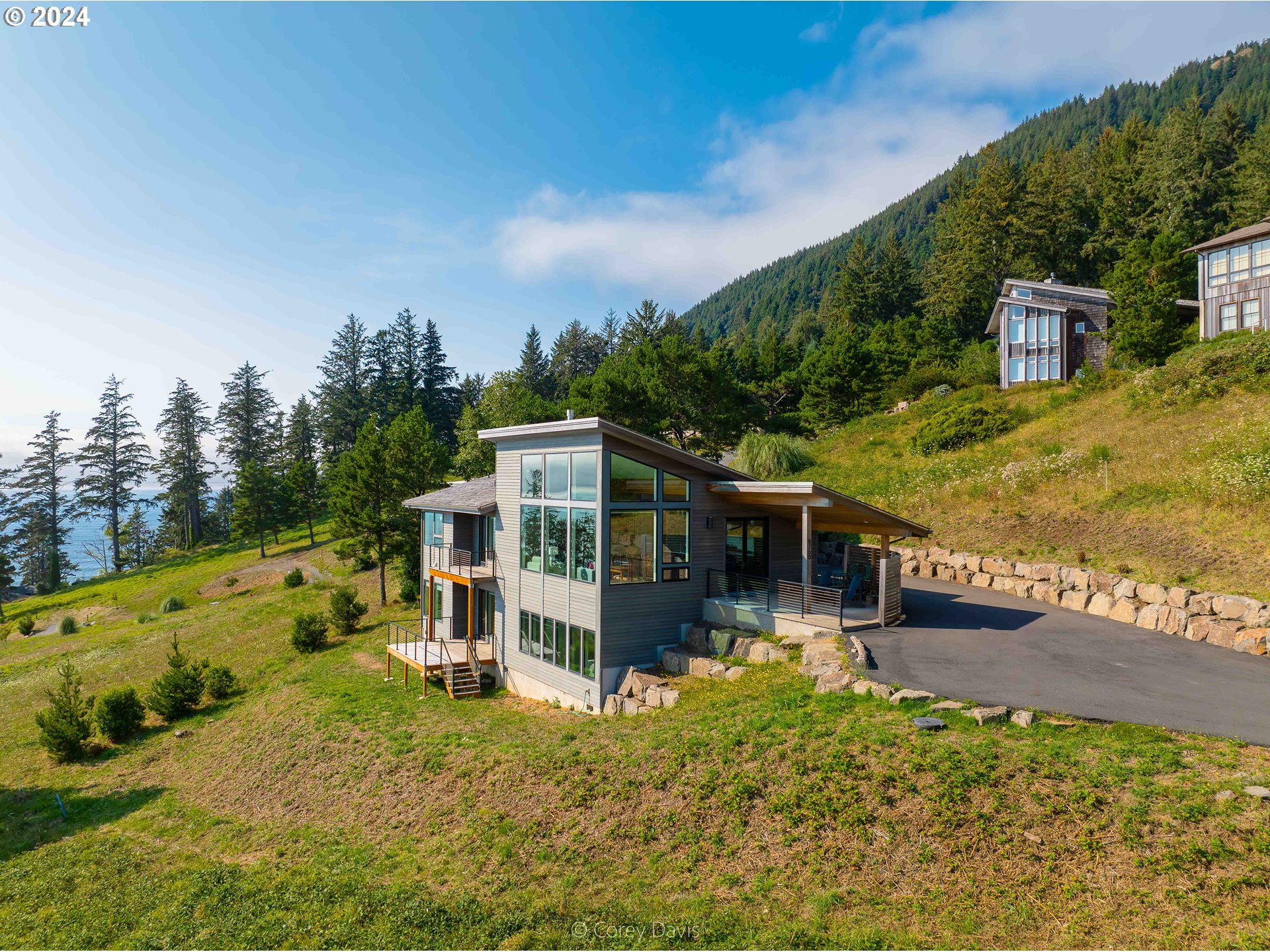 8760 Mariners Nehalem, OR 97131 - Photo 7 of 40 an aerial view of a house with swimming pool garden and patio