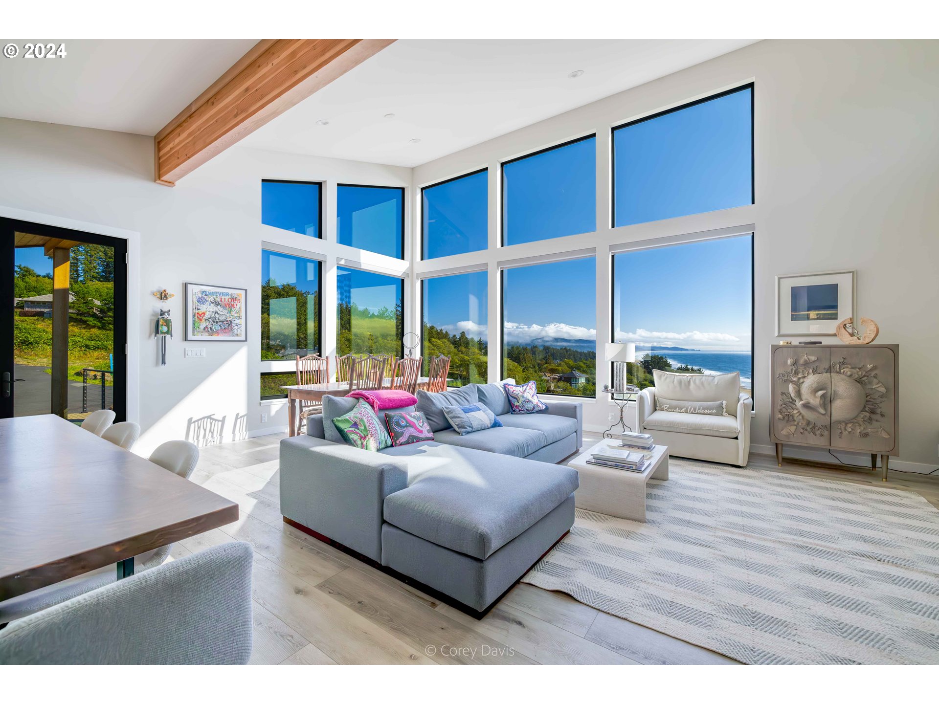 8760 Mariners Nehalem, OR 97131 - Photo 8 of 40 a living room with furniture and a large window