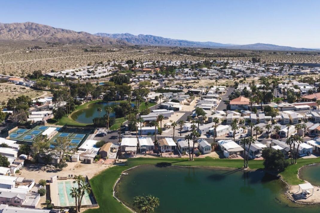 74711 Dillon Road Desert Hot Springs, CA 92241 - Photo 14 of 41 an aerial view of residential house with outdoor space and river