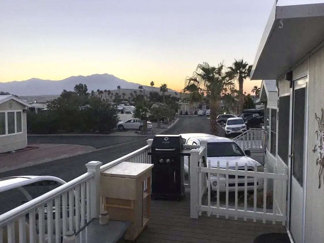 74711 Dillon Road Desert Hot Springs, CA 92241 - Photo 2 of 41 a terrace of a house with outdoor seating