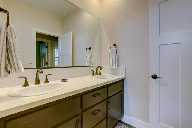 a view of a room with shelf on the wall