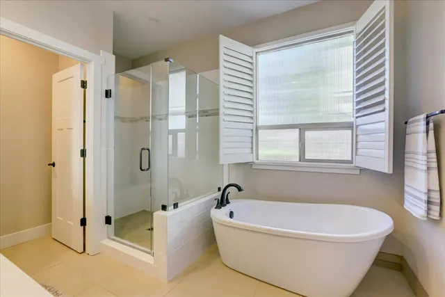 a view of a chairs and tables in patio