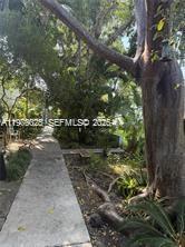 7700 Southwest 56th Avenue, Unit 4 Miami, FL 33143 - Photo 5 of 5 a view of yard