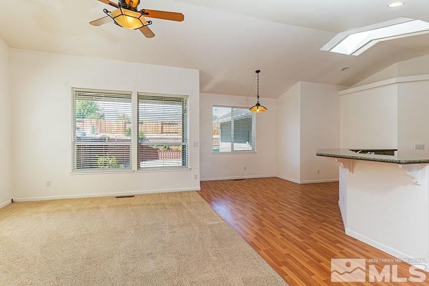 2895 Bryan Street Reno, NV 89503 - Photo 7 of 17 an empty room with a window and ceiling fan