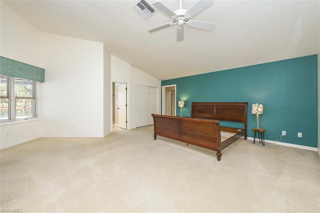 25 Grey Wing Point Naples, FL 34113 - Photo 14 of 25 a view of a livingroom with a furniture and ceiling fan