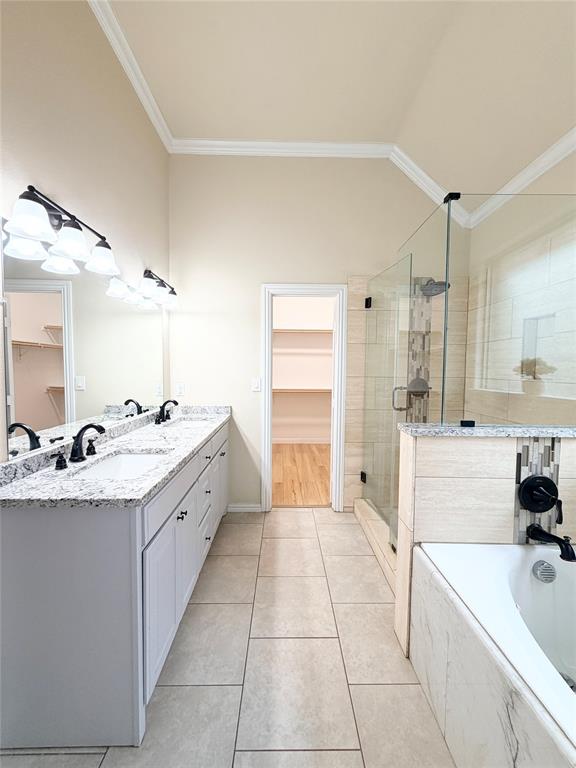 501 Elwood Road Irving, TX 75061 - Photo 16 of 30 a large white kitchen with a sink and cabinets