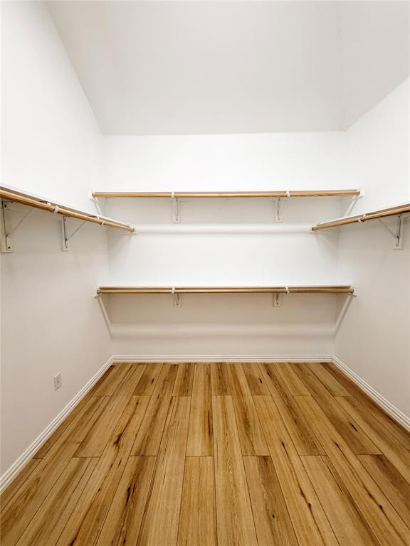 501 Elwood Road Irving, TX 75061 - Photo 17 of 30 a view of a room with wooden floor