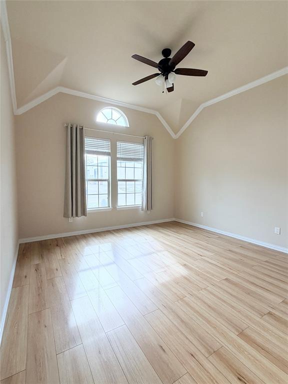 501 Elwood Road Irving, TX 75061 - Photo 20 of 30 an empty room with wooden floor and windows