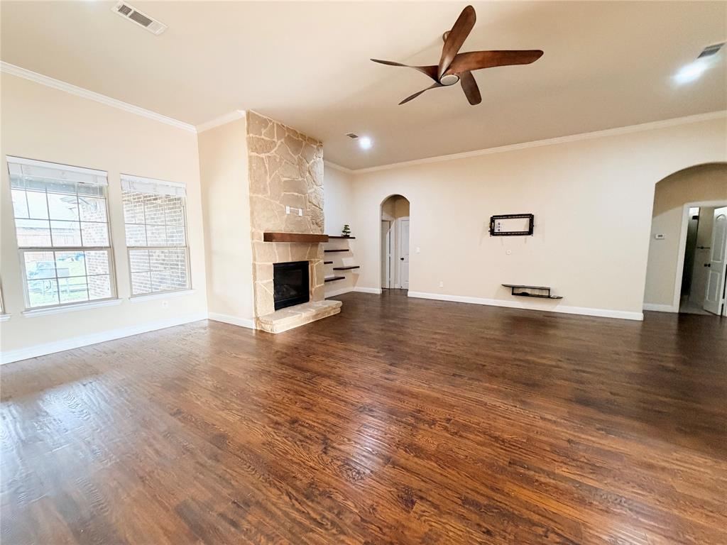 501 Elwood Road Irving, TX 75061 - Photo 2 of 30 wooden floor in an empty room with a window