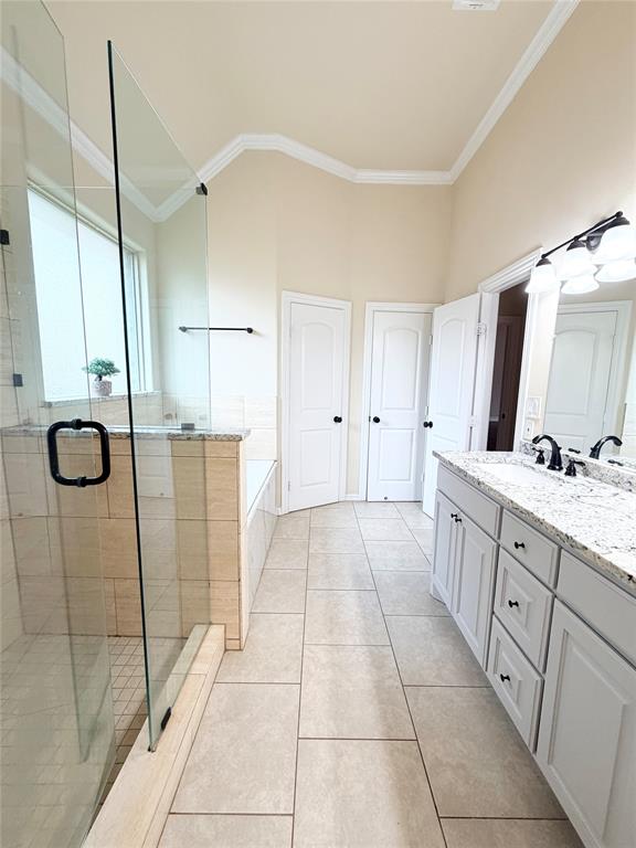 501 Elwood Road Irving, TX 75061 - Photo 25 of 30 a bathroom with a granite countertop sink a toilet and a mirror