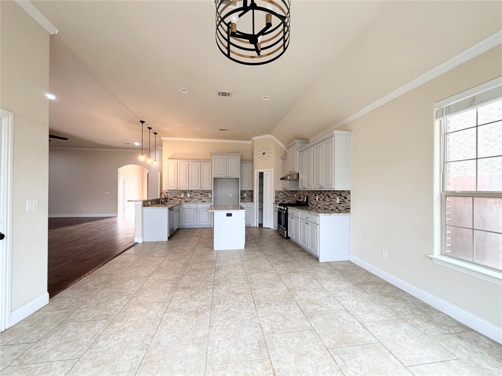 501 Elwood Road Irving, TX 75061 - Photo 9 of 30 a view of kitchen with stainless steel appliances cabinets and a kitchen counter top space
