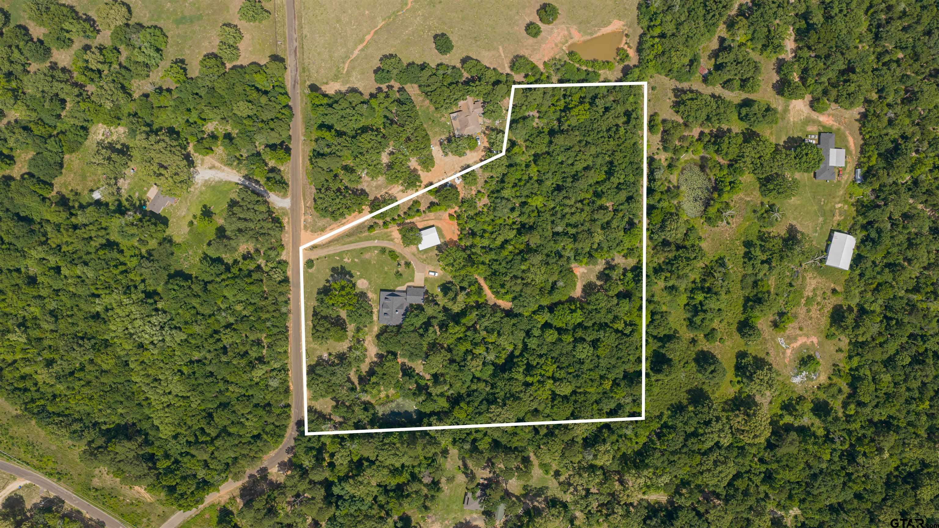 1776 Mustang Road Gilmer, TX 75645 - Photo 42 of 45 a view of a small garden