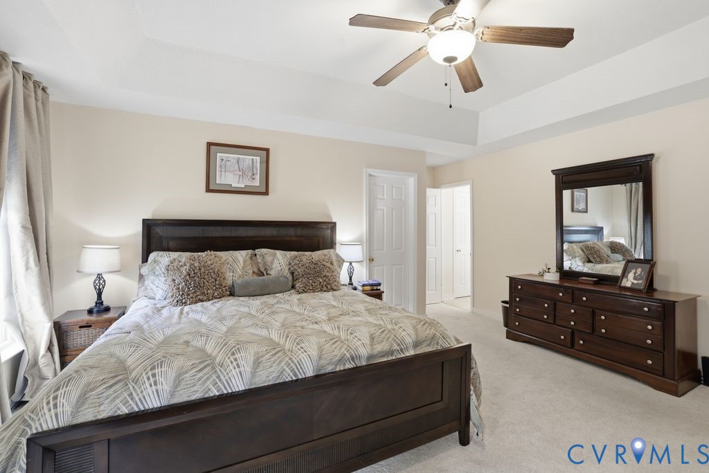 13630 River Road Chesterfield, VA 23838 - Photo 28 of 57 a bedroom with a bed and a dresser