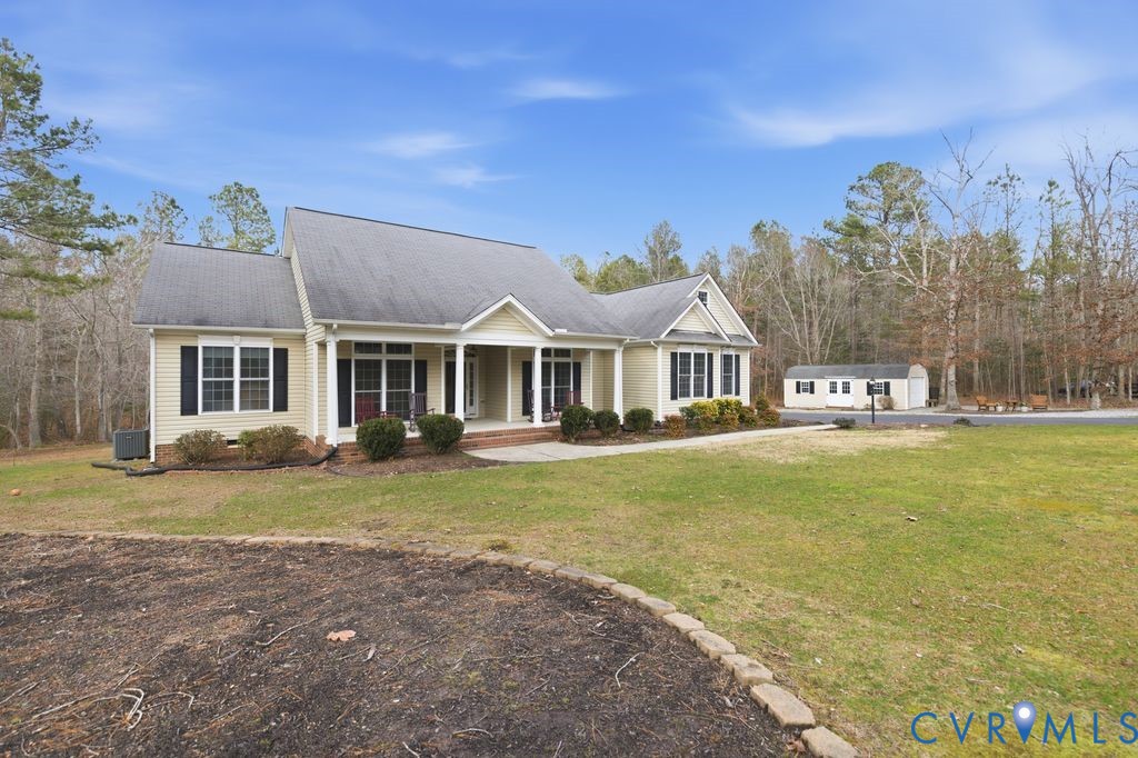 13630 River Road Chesterfield, VA 23838 - Photo 3 of 57 front view of a house with a yard