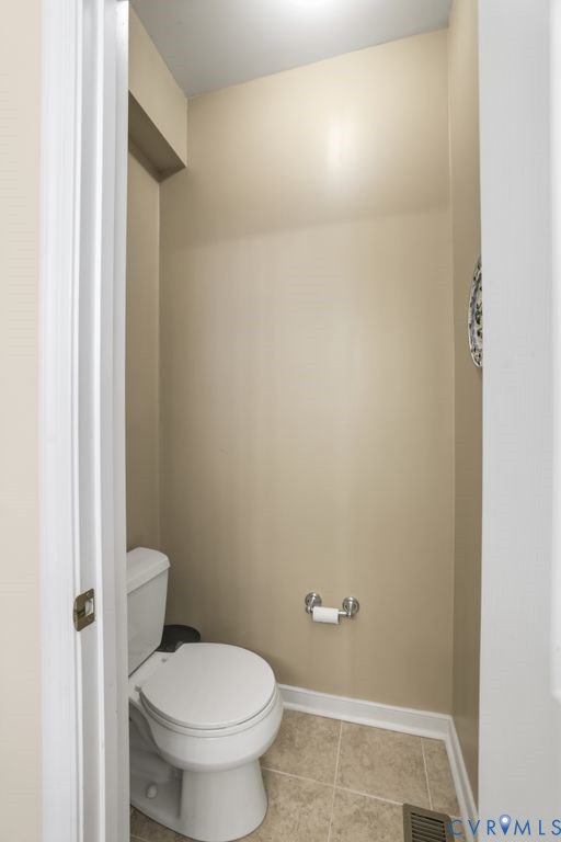 13630 River Road Chesterfield, VA 23838 - Photo 31 of 57 a bathroom with a toilet and a shower