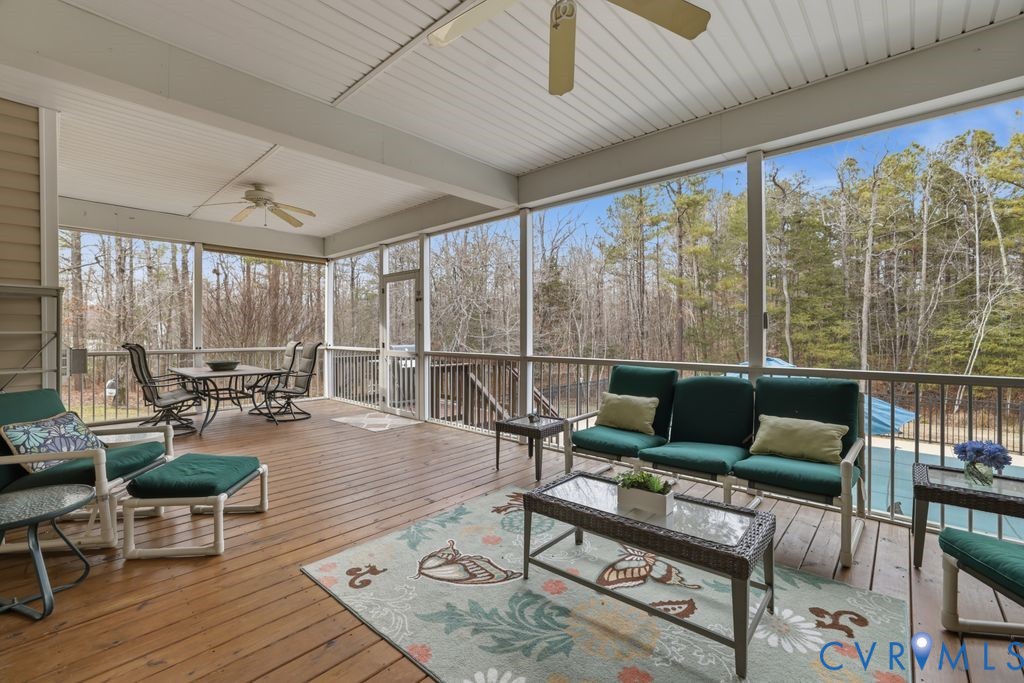 13630 River Road Chesterfield, VA 23838 - Photo 39 of 57 a living room with furniture and a large window