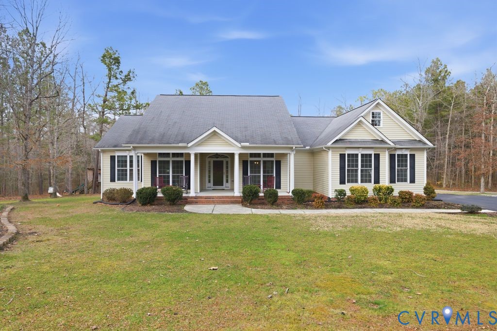 13630 River Road Chesterfield, VA 23838 - Photo 4 of 57 a front view of a house with a yard