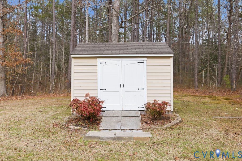 13630 River Road Chesterfield, VA 23838 - Photo 45 of 57 a view of a house with a yard