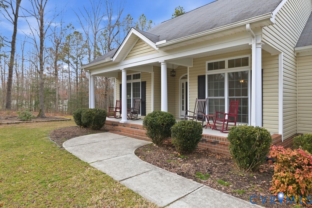 13630 River Road Chesterfield, VA 23838 - Photo 5 of 57 a view of a house with backyard and sitting area