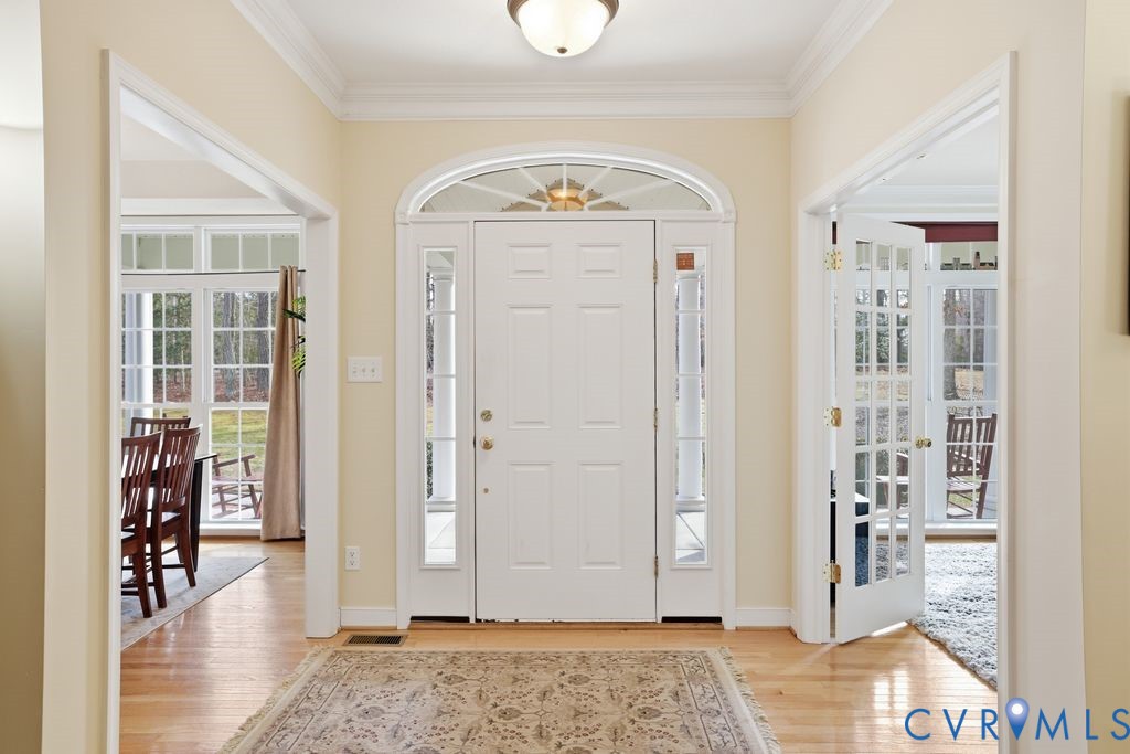 13630 River Road Chesterfield, VA 23838 - Photo 10 of 57 a view of a livingroom with wooden floor and a window