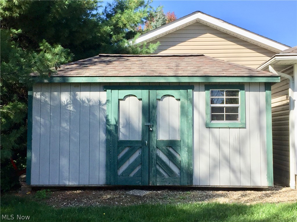 18925 Thorpe Road Chagrin Falls, OH 44023 - Photo 11 of 34 Large double door shed is nestled behind the garage in the back yard. Great additional storage space for outdoor furniture, mower and tools. Could be an awesome She Shed!