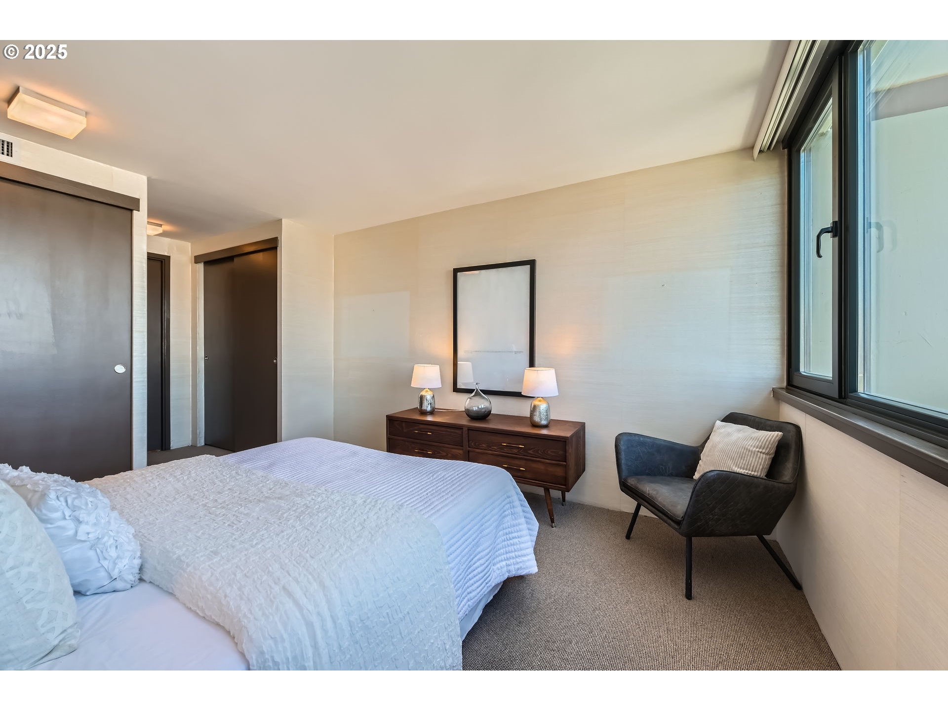 255 Southwest Harrison Street, Unit 21D Portland, OR 97201 - Photo 18 of 39 Primary Bedroom