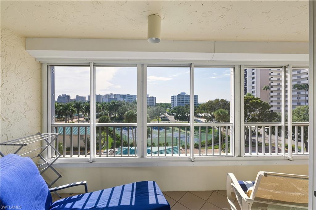 21 Bluebill Avenue, Unit 403B Naples, FL 34108 - Photo 17 of 37 a view of a room with a large window