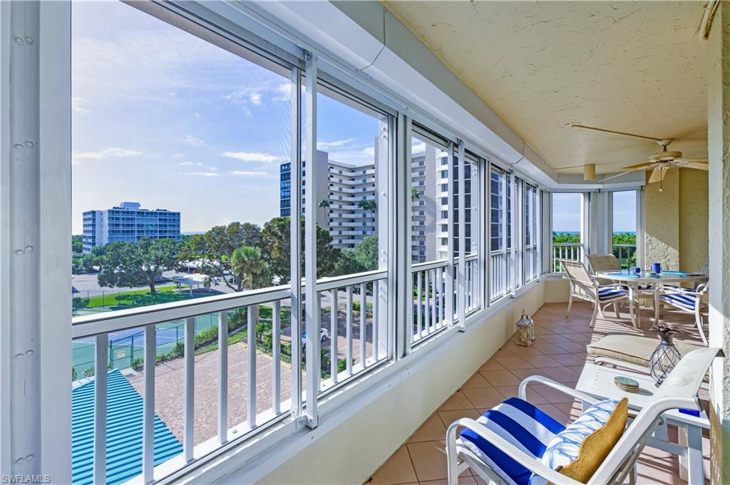 21 Bluebill Avenue, Unit 403B Naples, FL 34108 - Photo 28 of 37 a view of balcony with chairs