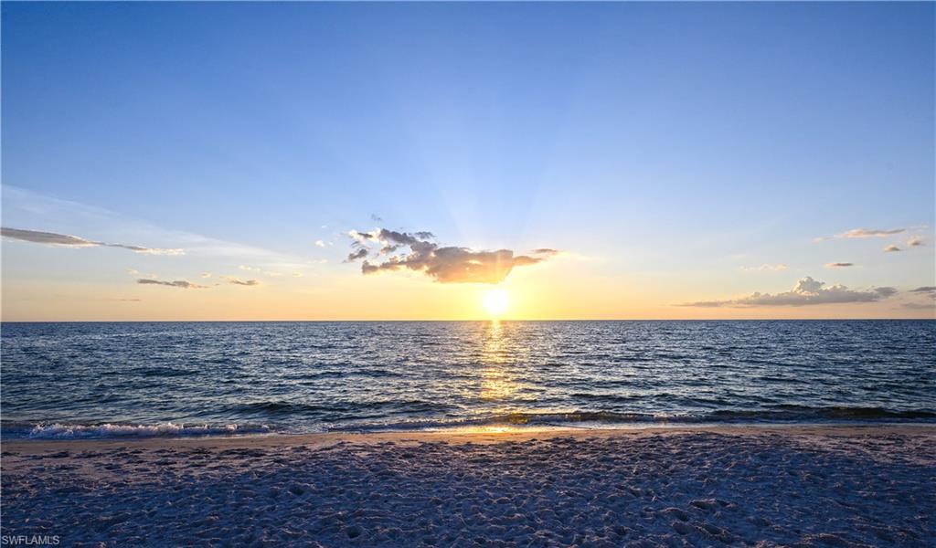 21 Bluebill Avenue, Unit 403B Naples, FL 34108 - Photo 37 of 37 a view of an ocean beach